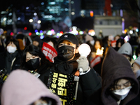 Thousands of citizens gather across from the National Assembly in Seoul, South Korea, on December 11, 2024, to call for the impeachment of P...