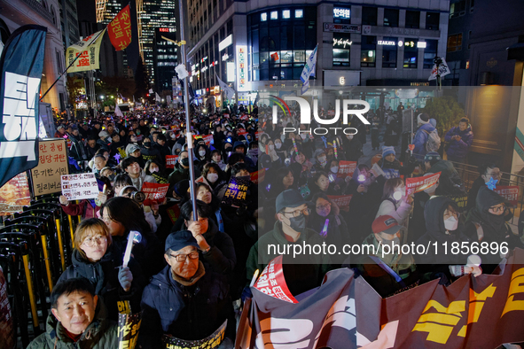 Thousands of citizens gather across from the National Assembly in Seoul, South Korea, on December 11, 2024, to call for the impeachment of P...