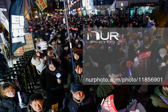 Thousands of citizens gather across from the National Assembly in Seoul, South Korea, on December 11, 2024, to call for the impeachment of P...