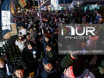 Thousands of citizens gather across from the National Assembly in Seoul, South Korea, on December 11, 2024, to call for the impeachment of P...