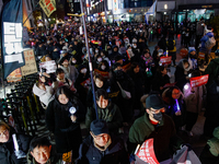 Thousands of citizens gather across from the National Assembly in Seoul, South Korea, on December 11, 2024, to call for the impeachment of P...