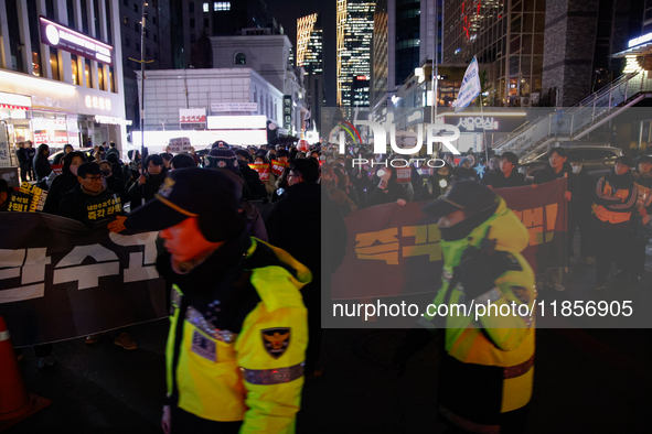 Thousands of citizens gather across from the National Assembly in Seoul, South Korea, on December 11, 2024, to call for the impeachment of P...