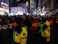 Thousands of citizens gather across from the National Assembly in Seoul, South Korea, on December 11, 2024, to call for the impeachment of P...