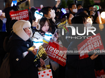 Thousands of citizens gather across from the National Assembly in Seoul, South Korea, on December 11, 2024, to call for the impeachment of P...