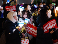 Thousands of citizens gather across from the National Assembly in Seoul, South Korea, on December 11, 2024, to call for the impeachment of P...