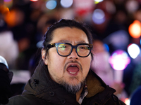 Thousands of citizens gather across from the National Assembly in Seoul, South Korea, on December 11, 2024, to call for the impeachment of P...