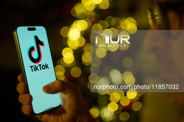 The TikTok logo is seen on a mobile device in this illustration photo taken in Warsaw, Poland on 11 December, 2024. 