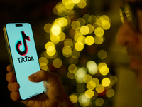 The TikTok logo is seen on a mobile device in this illustration photo taken in Warsaw, Poland on 11 December, 2024. (