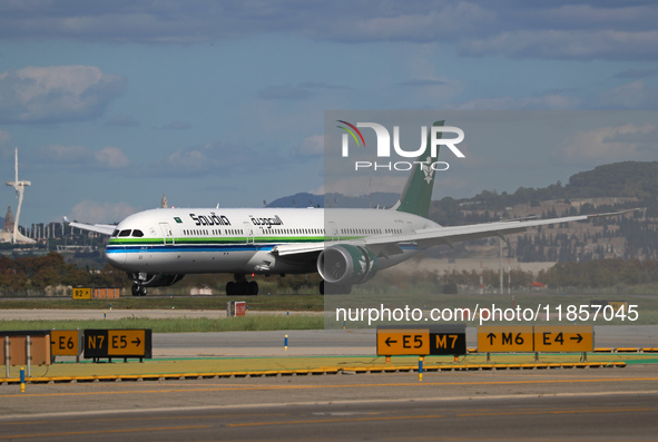 A Boeing 787-10 Dreamliner from Saudia is on the runway after landing at Barcelona El Prat Airport in Barcelona, Spain, on October 8, 2024. 