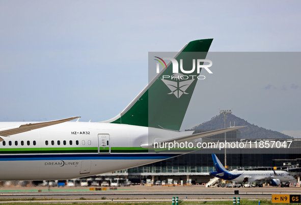 A Boeing 787-10 Dreamliner from Saudia is on the runway after landing at Barcelona El Prat Airport in Barcelona, Spain, on October 8, 2024. 