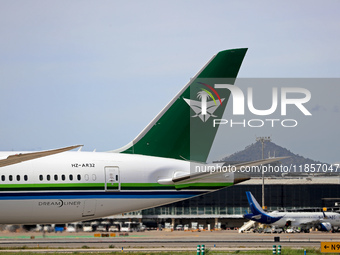 A Boeing 787-10 Dreamliner from Saudia is on the runway after landing at Barcelona El Prat Airport in Barcelona, Spain, on October 8, 2024....