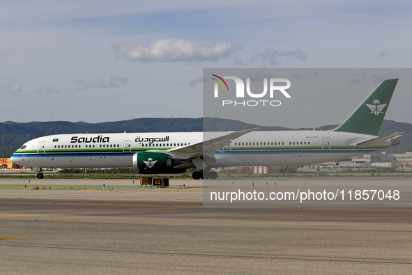 A Boeing 787-10 Dreamliner from Saudia is on the runway after landing at Barcelona El Prat Airport in Barcelona, Spain, on October 8, 2024. 