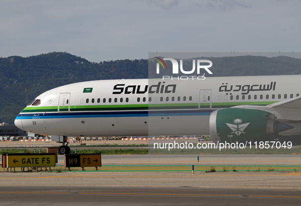 A Boeing 787-10 Dreamliner from Saudia is on the runway after landing at Barcelona El Prat Airport in Barcelona, Spain, on October 8, 2024. 