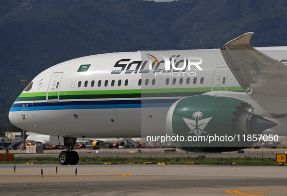 A Boeing 787-10 Dreamliner from Saudia is on the runway after landing at Barcelona El Prat Airport in Barcelona, Spain, on October 8, 2024. 