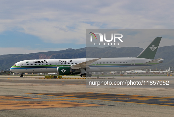 A Boeing 787-10 Dreamliner from Saudia is on the runway after landing at Barcelona El Prat Airport in Barcelona, Spain, on October 8, 2024. 