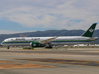 A Boeing 787-10 Dreamliner from Saudia is on the runway after landing at Barcelona El Prat Airport in Barcelona, Spain, on October 8, 2024....