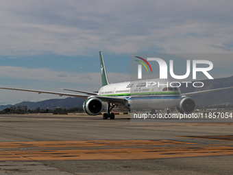 A Boeing 787-10 Dreamliner from Saudia is on the runway after landing at Barcelona El Prat Airport in Barcelona, Spain, on October 8, 2024....