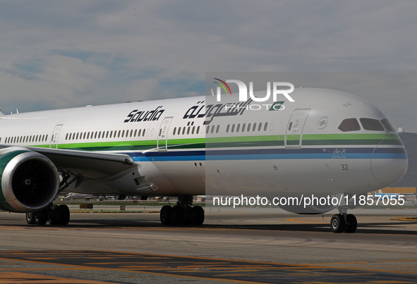 A Boeing 787-10 Dreamliner from Saudia is on the runway after landing at Barcelona El Prat Airport in Barcelona, Spain, on October 8, 2024. 