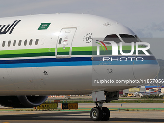 A Boeing 787-10 Dreamliner from Saudia is on the runway after landing at Barcelona El Prat Airport in Barcelona, Spain, on October 8, 2024....