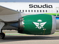 A Boeing 787-10 Dreamliner from Saudia is on the runway after landing at Barcelona El Prat Airport in Barcelona, Spain, on October 8, 2024....