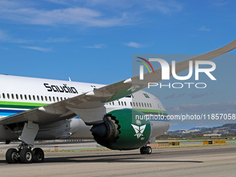 A Boeing 787-10 Dreamliner from Saudia is on the runway after landing at Barcelona El Prat Airport in Barcelona, Spain, on October 8, 2024....