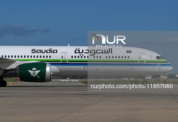 A Boeing 787-10 Dreamliner from Saudia is on the runway after landing at Barcelona El Prat Airport in Barcelona, Spain, on October 8, 2024. 