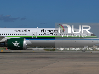 A Boeing 787-10 Dreamliner from Saudia is on the runway after landing at Barcelona El Prat Airport in Barcelona, Spain, on October 8, 2024....