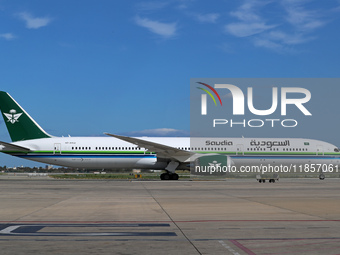 A Boeing 787-10 Dreamliner from Saudia is on the runway after landing at Barcelona El Prat Airport in Barcelona, Spain, on October 8, 2024....