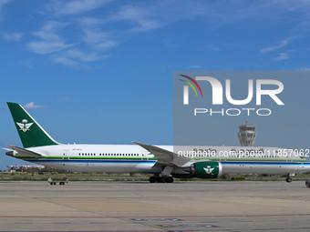 A Boeing 787-10 Dreamliner from Saudia is on the runway after landing at Barcelona El Prat Airport in Barcelona, Spain, on October 8, 2024....