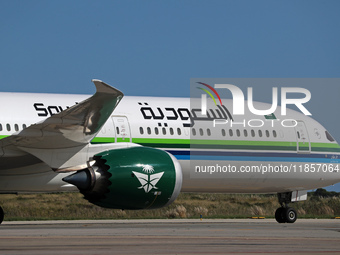 A Boeing 787-10 Dreamliner from Saudia is on the runway after landing at Barcelona El Prat Airport in Barcelona, Spain, on October 8, 2024....