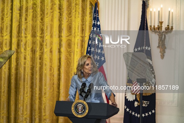 President Joe Biden and First Lady Jill Biden make remarks at the first-ever White House Conference on Women's Health Research in Washington...