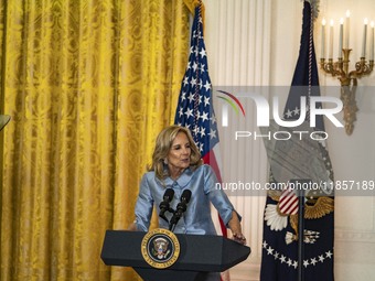 President Joe Biden and First Lady Jill Biden make remarks at the first-ever White House Conference on Women's Health Research in Washington...