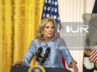 President Joe Biden and First Lady Jill Biden make remarks at the first-ever White House Conference on Women's Health Research in Washington...