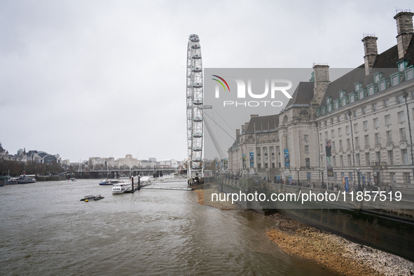 The Thames River with the London Eye in the background, in London, United Kingdom, on December 7, 2024. 