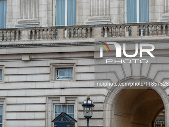 A royal guard stands at his post outside Buckingham Palace, in London, United Kingdom, on December 7, 2024. (