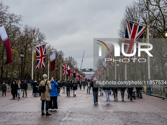 People walk along The Mall toward Buckingham Palace, in London, United Kingdom, on December 7, 2024 (