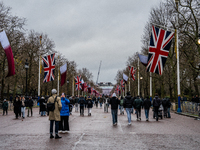 People walk along The Mall toward Buckingham Palace, in London, United Kingdom, on December 7, 2024 (