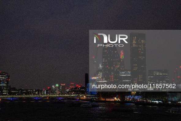 A view of the Thames River and the London skyline at night, in London, United Kingdom, on December 7, 2024. 