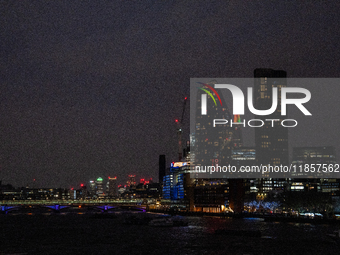 A view of the Thames River and the London skyline at night, in London, United Kingdom, on December 7, 2024. (