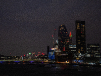 A view of the Thames River and the London skyline at night, in London, United Kingdom, on December 7, 2024. (