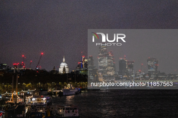 A view of the Thames River and the London skyline at night, in London, United Kingdom, on December 7, 2024. 