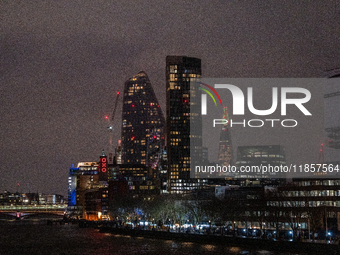 A view of the Thames River and the London skyline at night, in London, United Kingdom, on December 7, 2024. (