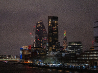 A view of the Thames River and the London skyline at night, in London, United Kingdom, on December 7, 2024. (