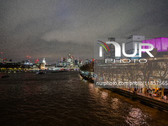 A view of the Thames River and the London skyline at night, in London, United Kingdom, on December 7, 2024. (