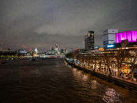 A view of the Thames River and the London skyline at night, in London, United Kingdom, on December 7, 2024. (