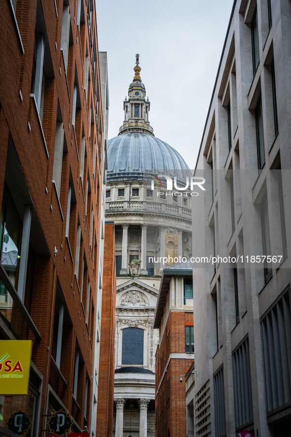 A view of St. Paul's Cathedral framed by modern buildings, in London, United Kingdom, on December 8, 2024 