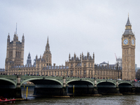 The Houses of Parliament and Big Ben under overcast skies during Storm Darragh on December 7, 2024, in London, United Kingdom. London's Roya...