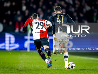 Feyenoord Rotterdam forward Santiago Gimenez and Sparta Praha defender Martin Vitik play during the match between Feyenoord and Sparta Praha...