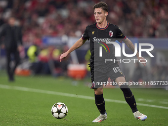 Kacper Urbanski of Bologna Football Club 1909 is in action during the UEFA Champions League match between SL Benfica and Bologna FC 1909 at...