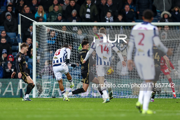 Number 18, Karlan Grant of WBA attempts a shot on goal as half-time approaches during the Sky Bet Championship match between West Bromwich A...